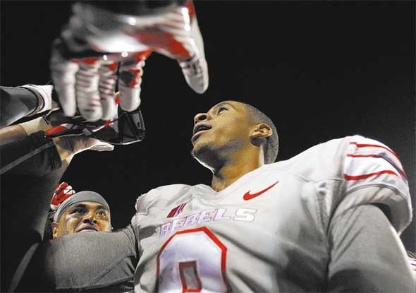 UNLV quarterback Caleb Herring celebrates