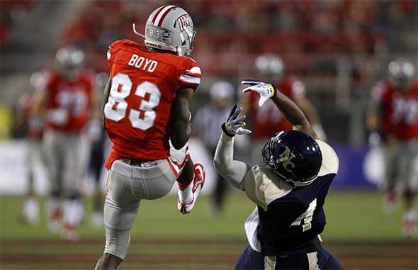 UNLV's Devonte Boyd snatches the ball from defender's grasp