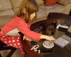 Child playing Ring of Stones