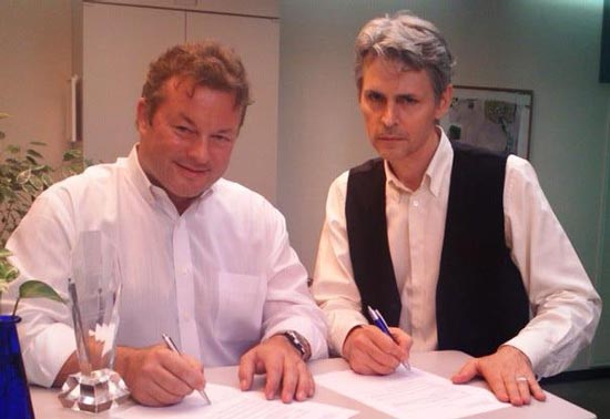 Dave Schaufele (left) and Guy Cihi (right) sign waivers permitting the use of their voice recordings for the Silent Hill HD Collection