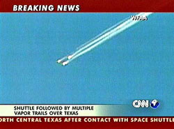 The space shuttle Columbia explodes during re-entry in February 2003