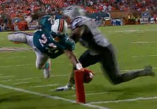 Patriots 38, Dolphins 24 - Reggie Bush breaks the plane, but was called out of bounds on the field.